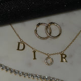 Gold CR Necklace